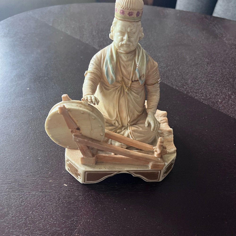 Royal Worcester Cream and Tan Figurine of Seated Weaver